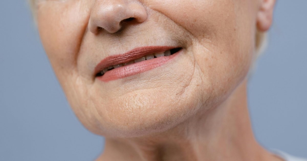 Mature woman considering why aesthetic treatments don't work and weighing honest options